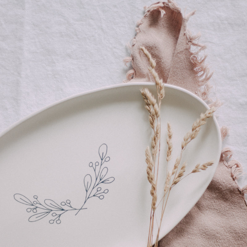 Handmade plate with botanical illustrations by Muddy Marvels Pottery and Natasshia Neary