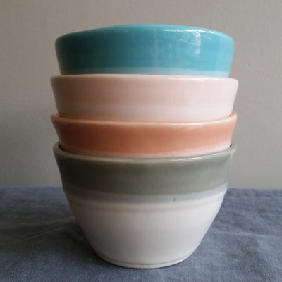 Small handmade pottery bowl coral glaze